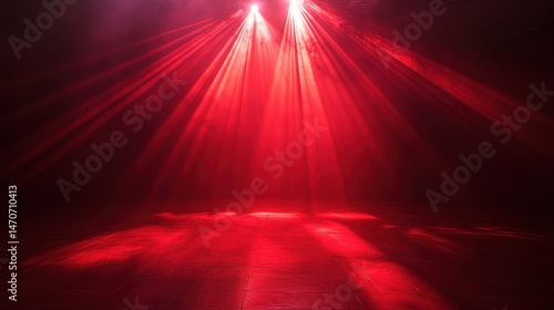 Vibrant Stage Lights: Red Spotlight Piercing the Dark for an Electric Show Experience