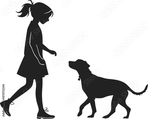 Silhouette of a young girl walking alongside a dog in a friendly and heartwarming display