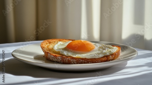 Wallpaper Mural Close-up of a fried egg on toasted bread. Torontodigital.ca