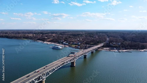 Wallpaper Mural Aerial view of the Coleman Memorial Bridge stretching across the York River into Yorktown, Virginia, on a clear, sunny afternoon with light traffic and calm waters. Torontodigital.ca