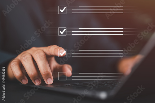 Фотография Businessman finger selecting checklist item on virtual interface, representing task management, productivity, planning, decision making, and digital workflow in modern business