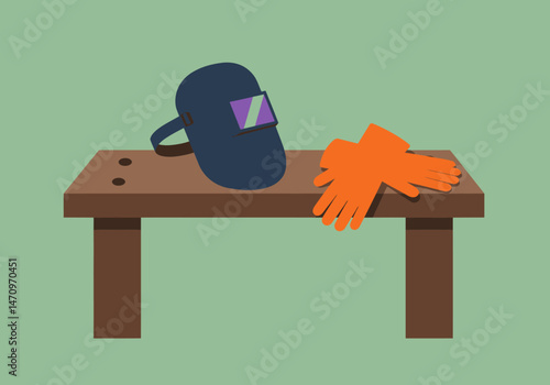 Welding Safety Equipment Protective Gear on Wooden Workbench