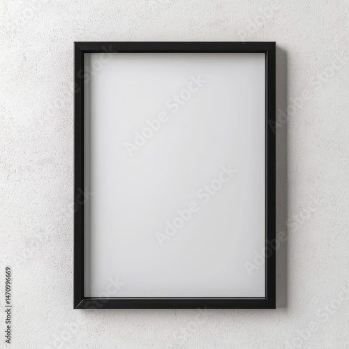 Empty Black Frame on a Light Gray Wall for Artwork Display