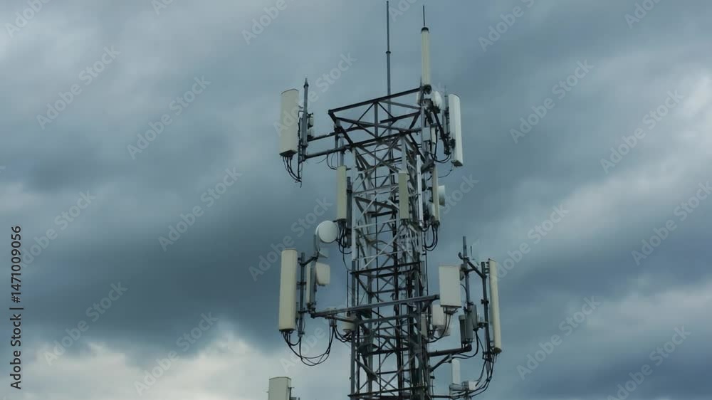 Observing Communication Tower against Dark Cloudy Sky Observing Communication Tower against Dark Cloudy Sky