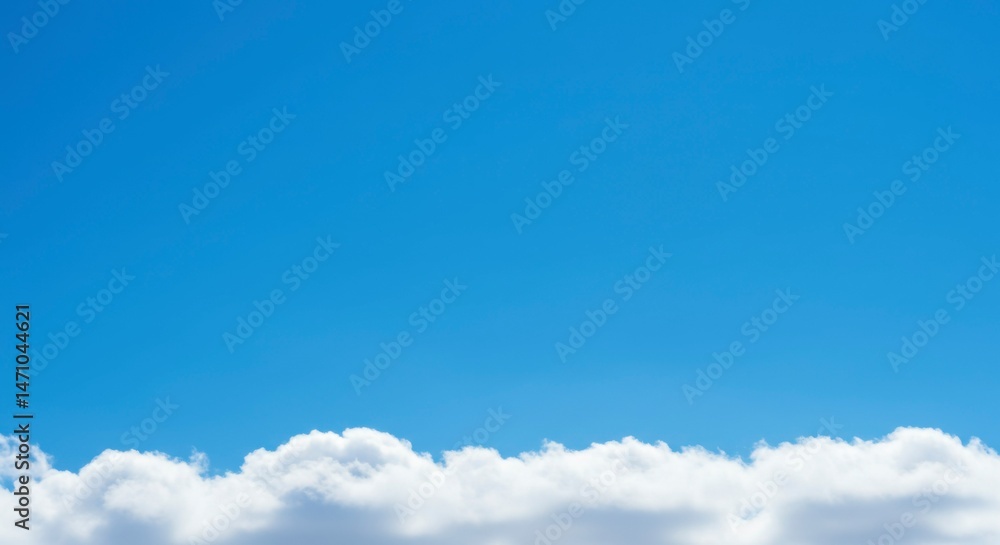 Obraz premium Clear sky with fluffy clouds