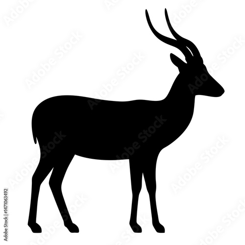 Silhouette of a slender horned antelope standing against a white background