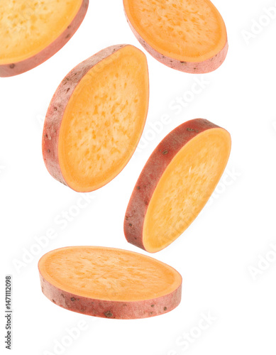 CloseUp View of Yam Slices Falling Against White png