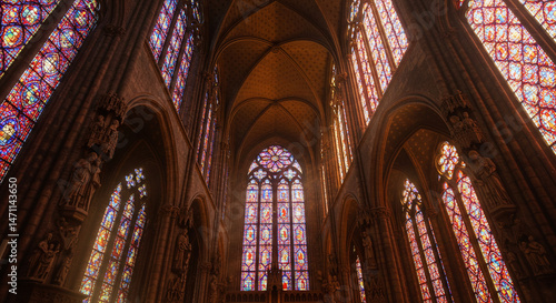Majestic Interior View of Ancient Cathedral with Stained Glass Windows