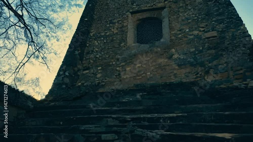 Wallpaper Mural Tracking video along a winding staircase in an old castle tower, dramatic side lighting emphasizing the spiral and shadows on stone steps Torontodigital.ca