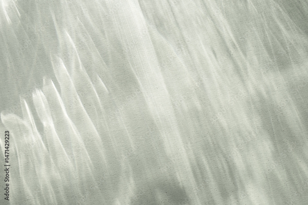 Abstract shadows background from pouring sunlight top view. Natural caustic background from light glare and shine reflection effects for product presentation. Abstract shadows background from pouring sunlight top view. Natural caustic background from light glare and shine reflection effects for product presentation.