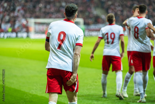 Obraz na płótnie Injured soccer player holding his leg w salonie