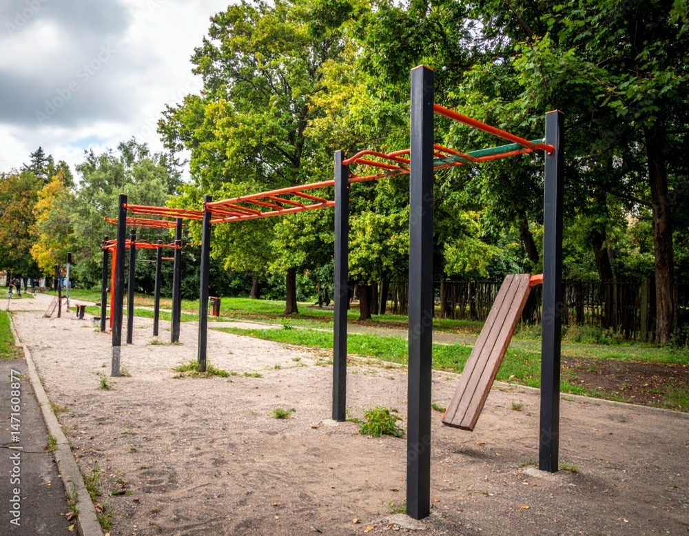 Outdoor Fitness Equipment in Urban Park Surrounded by Greenery Outdoor Fitness Equipment in Urban Park Surrounded by Greenery