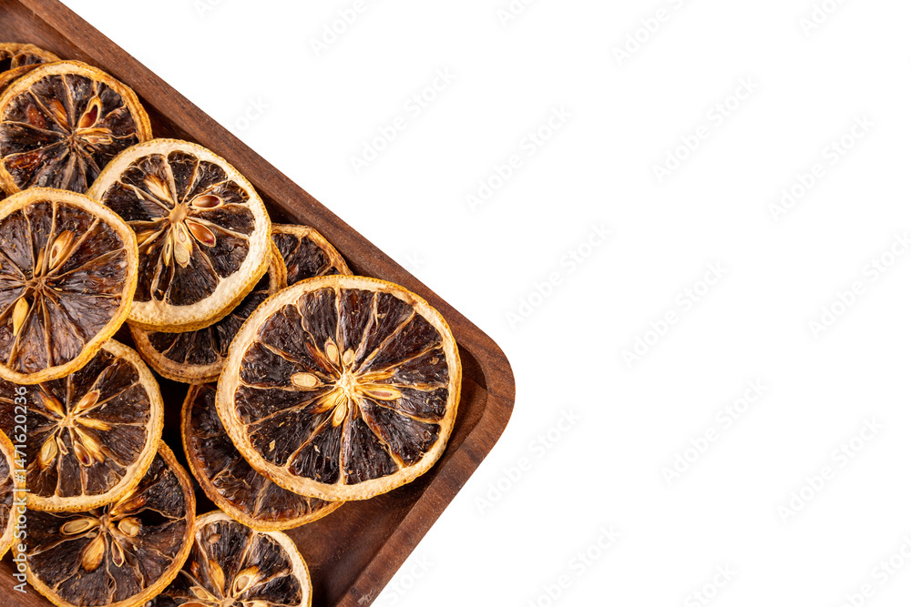 Fototapeta premium Dried lemon slices under macro lens, white background