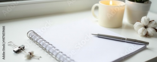 White table, blank notebook, pen, candle, binder clips, cotton , creative, workspace, simple