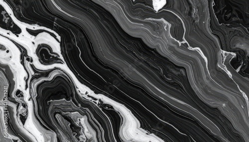 Swirling black and white marble textures display a dramatic, abstract pattern evoking natural stone and elegant design.