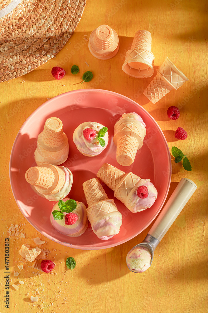 Sweet and delicious raspberry ice cream made of red berries.