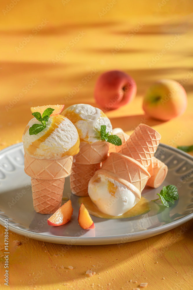 Fresh and delicious peach ice cream made of juicy fruit.