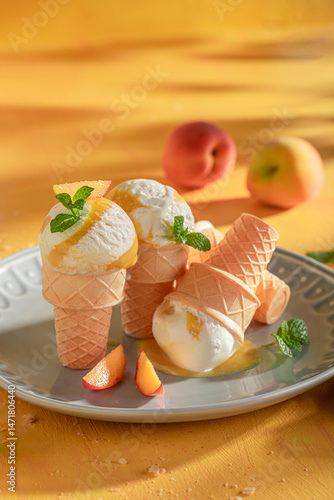 Fresh and delicious peach ice cream made of juicy fruit.