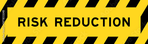 Yellow and black color with line striped label banner with word risk reduction