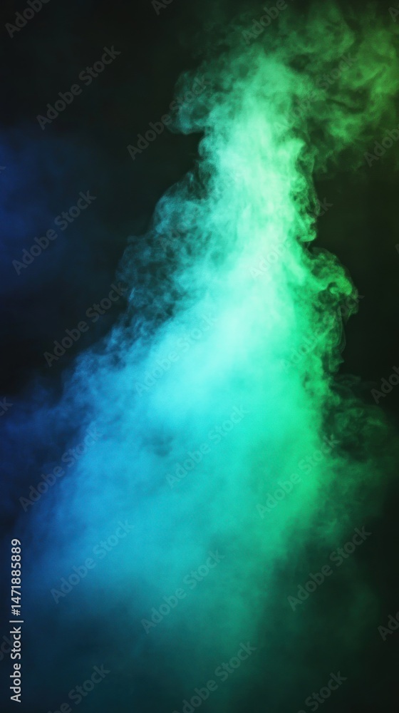 Fototapeta premium Abstract teal and green smoke plume against black background