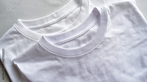 White T-shirt with Prominent Central Stain on Plain Beige Background, Minimalist Apparel Display Concept.