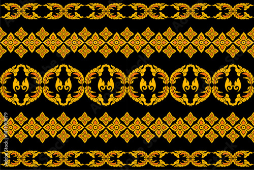 Elegant traditional Thai pattern with intricate golden floral and flame motifs on a black background. The seamless ornamental design is inspired by classic Thai art, suitable for textile design, cultu