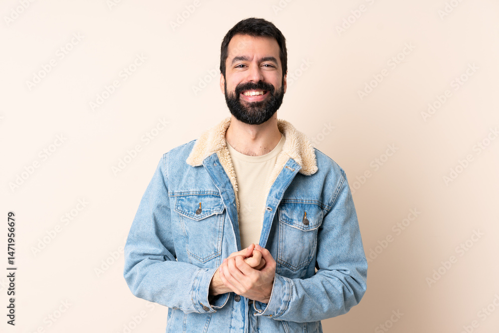 Caucasian man with beard over isolated background laughing Caucasian man with beard over isolated background laughing