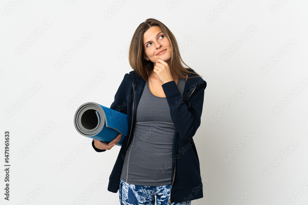 Fototapeta premium Slovak girl going to yoga classes isolated on white background and looking up