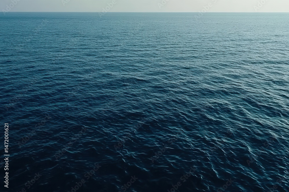 Obraz premium Vibrant Turquoise Sea Texture Calm Ocean Surface and Gentle Ripple Water in Tranquil Blue Tones Natural Maritime Background with Serene Environment and Scenic Horizon