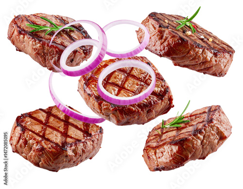 Obraz na płótnie Grilled Steak with Onion Rings Isolated Delicious Beef BBQ Ready to Eat Food Photography w salonie