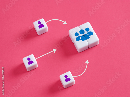 Fotografi Individuals moving towards group icon depicting joining a team