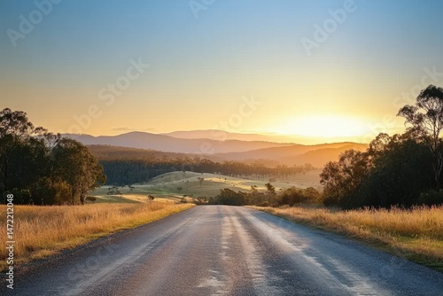 Sunset Over Rolling Hills and a Country Road