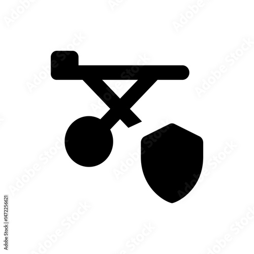 Black abstract icon featuring a table like structure with legs and a shield like shape on the rightside