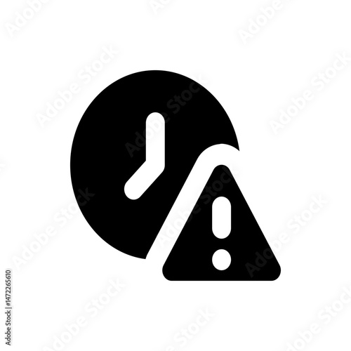 Clock with short hand and a triangle warning sign indicating a time related alert or notification issue present