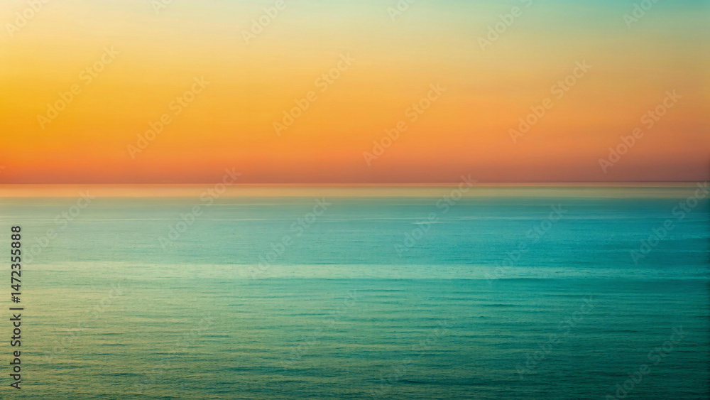Fototapeta premium An orange and blue gradient resembling a sunset over water