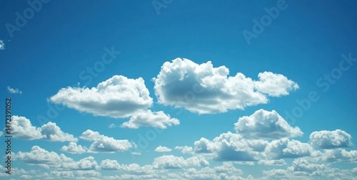 A vibrant blue sky canvas dotted with fluffy cumulus clouds, creating a serene and peaceful atmosphere. Perfect for illustrating concepts of freedom, tranquility, or summer. : Generative AI