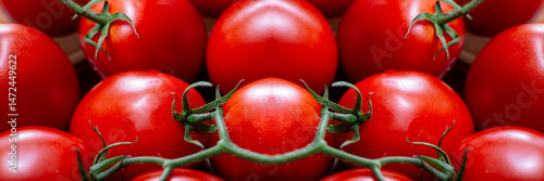 Freshly picked ripe tomatoes make a colorful display at the market © aviavlad
