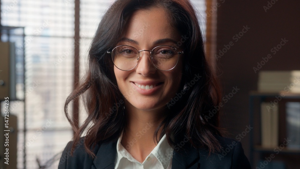 Fototapeta premium Cheerful Caucasian woman wear glasses vision health eyes female girl businesswoman business office indoor looking at camera optic smiling employee manager eyeglasses happy entrepreneur eyesight pose