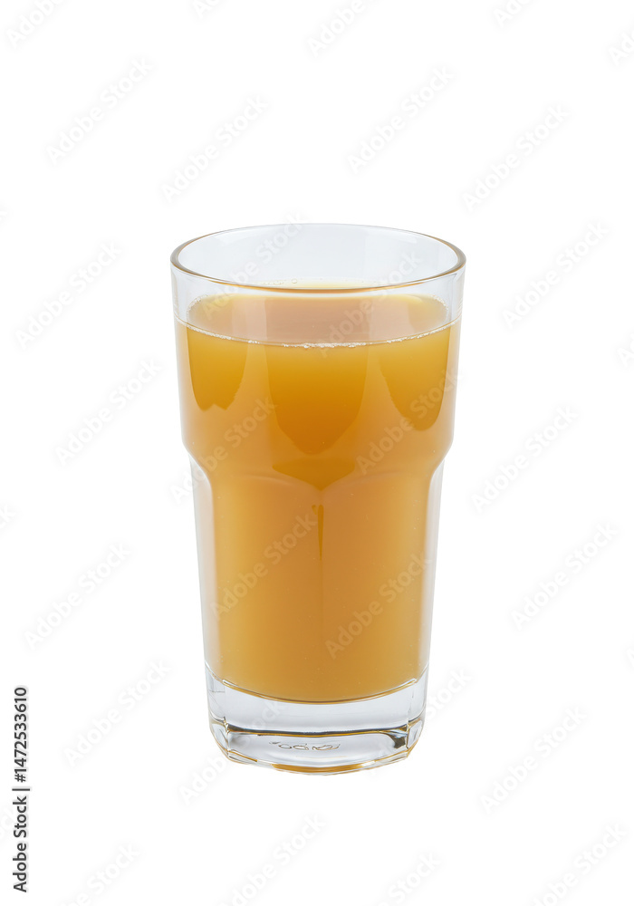 Glass filled with golden juice, sitting against black backdrop. Simple studio still life Glass filled with golden juice, sitting against black backdrop. Simple studio still life