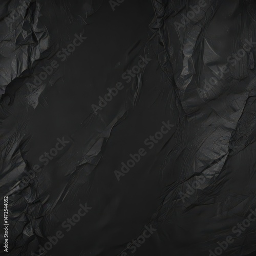 Deep black paper texture, showing creases and wear  High-resolution scan of aged paper ,  background,  paper