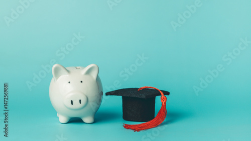 Piggy bank with graduation ...