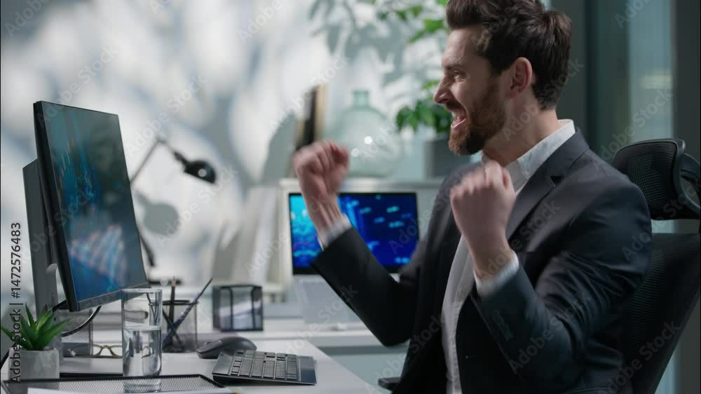 Happy Caucasian businessman working computer typing pc winning business ...
