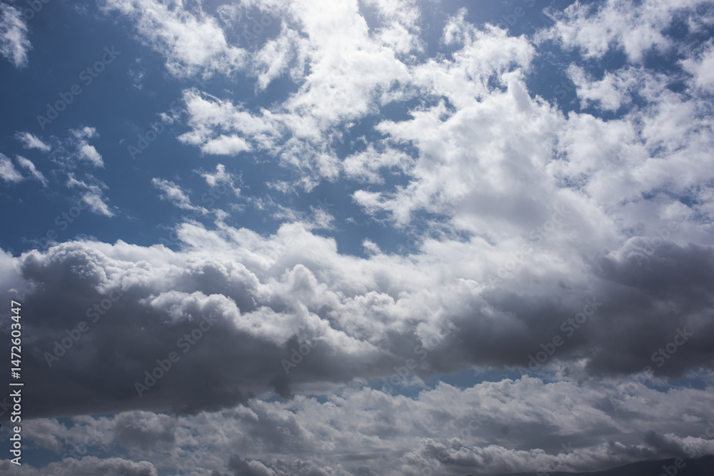 Fototapeta premium grey clouds in a blue sky