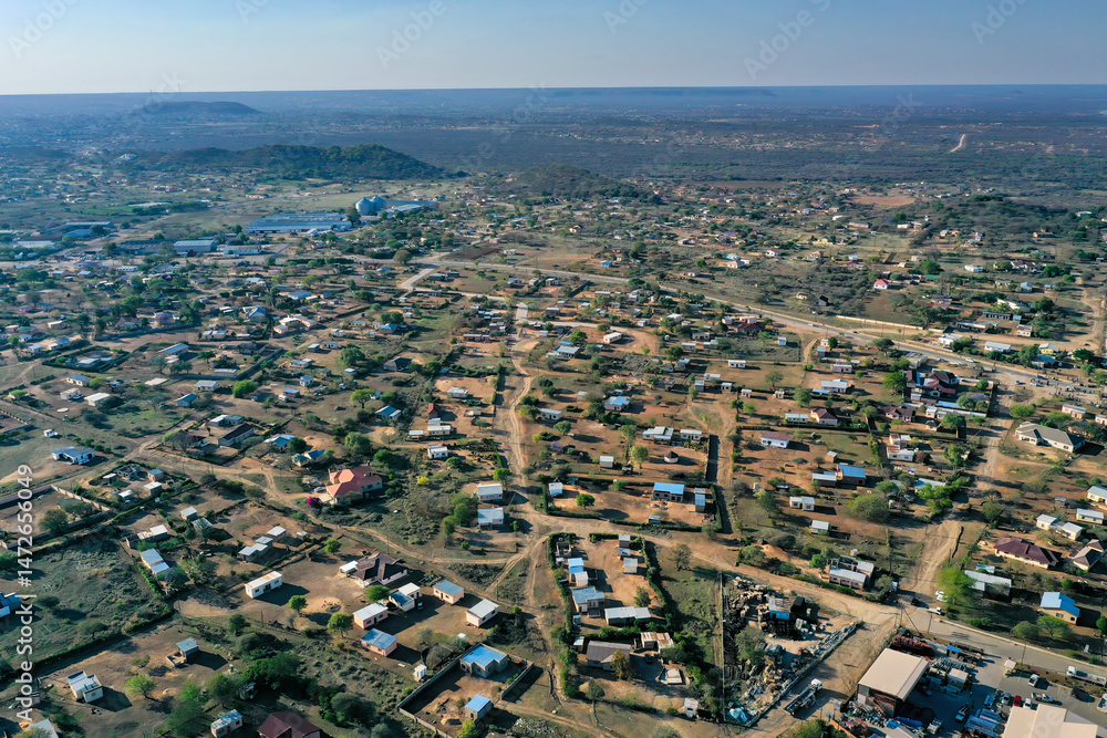 Obraz premium aerial view Botswana African village Serowe, infrastructure highway with traffic cars