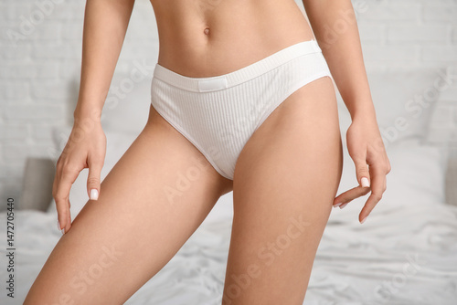 Beautiful young woman in wh...