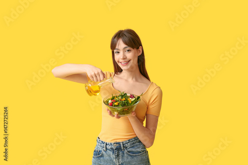 Smiling young woman pouring...