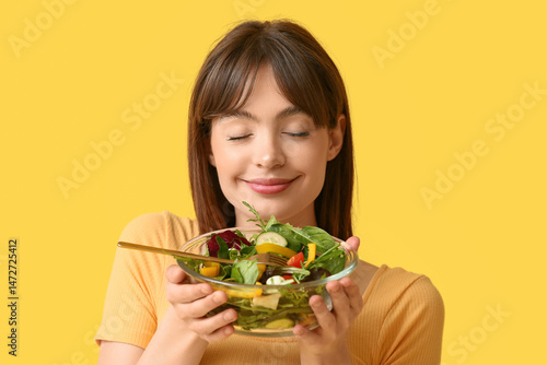 Happy young woman enjoying ...