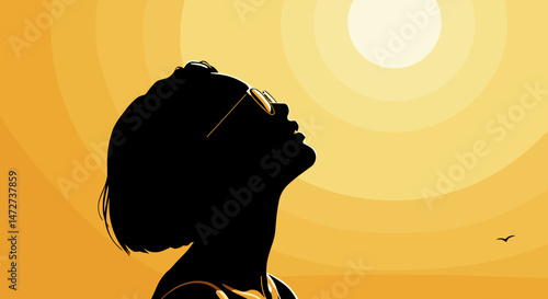 Silhouette of a woman enjoying sunlight against a yellow backdrop  