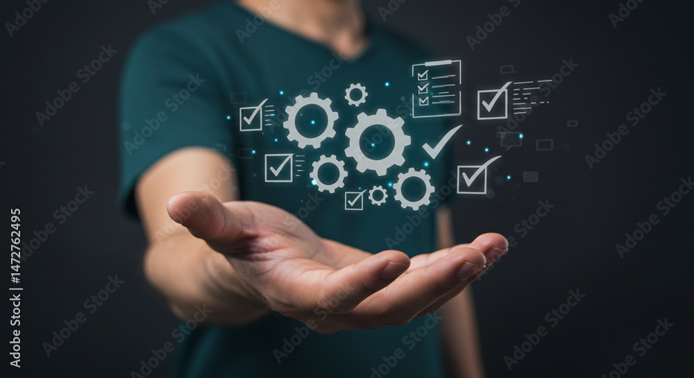 Fototapeta premium A person holding digital gears and checkmarks in their hand against a dark background, concept design