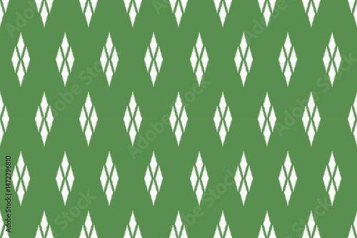 Green ikat pattern. Elegant diamond design. Seamless repeat for stylish dresses and apparel. 
